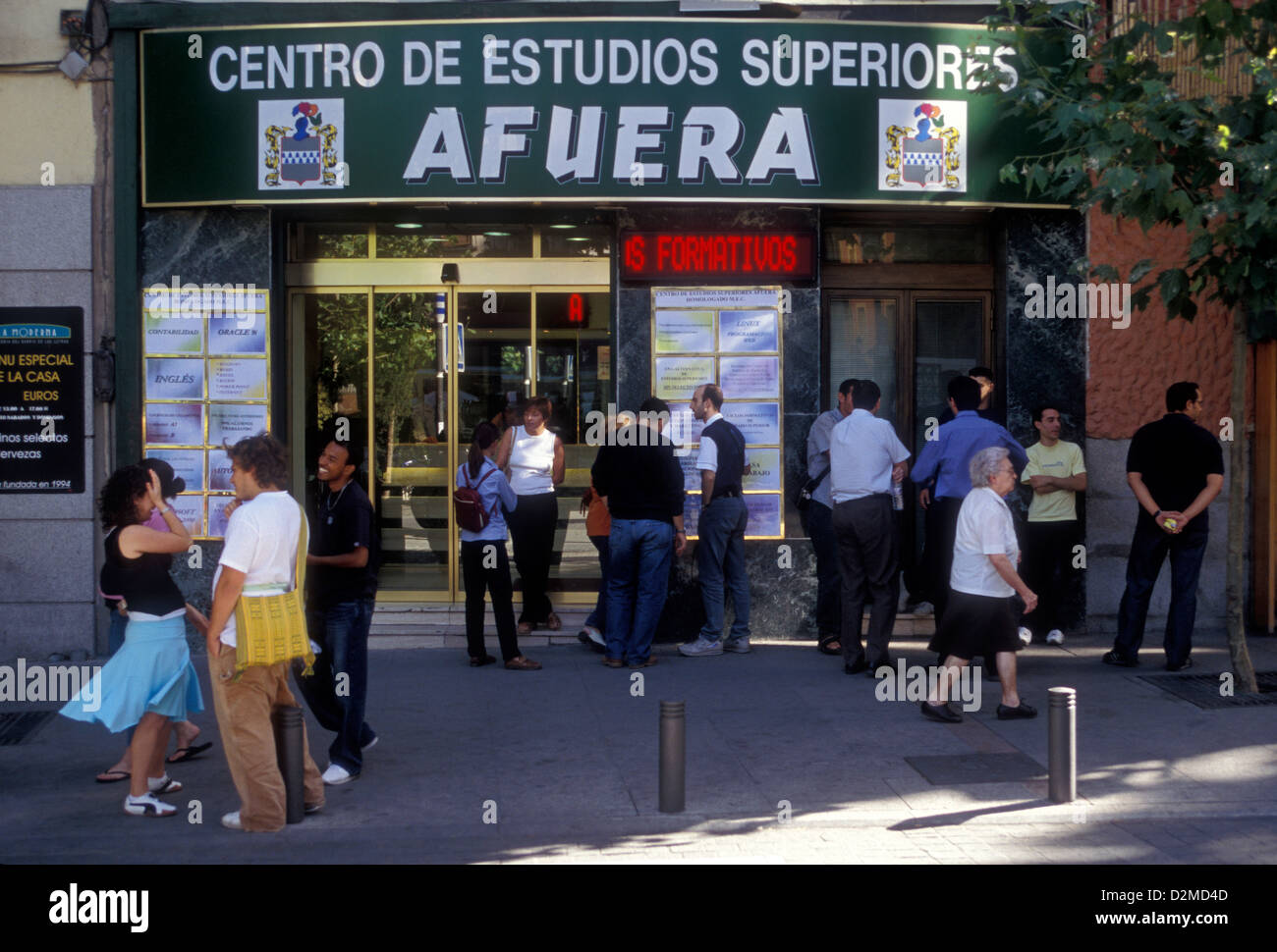 Spaniards, Spanish people, Centro de Estudios Superiores, AFUERA, Plaza de Santa Ana, Madrid, Madrid Province, Spain, Europe Stock Photo