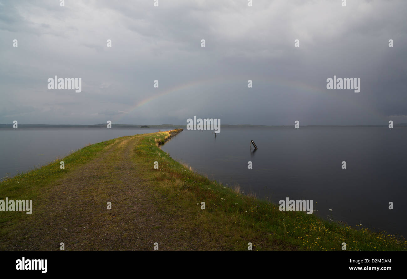 Rainy day and a long breakwater at lake Konnevesi Finland Stock Photo