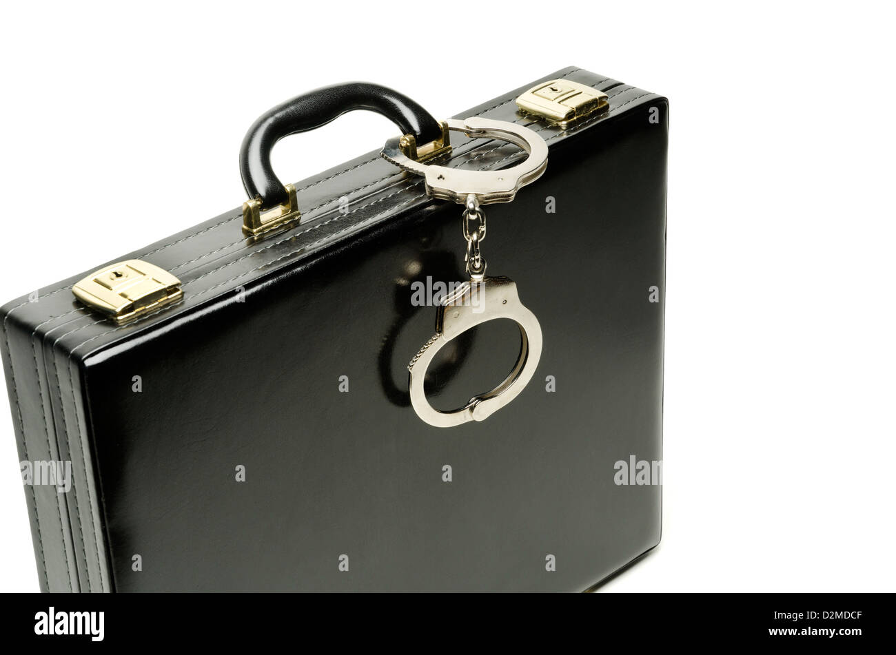 Briefcase and handcuffs Stock Photo Alamy