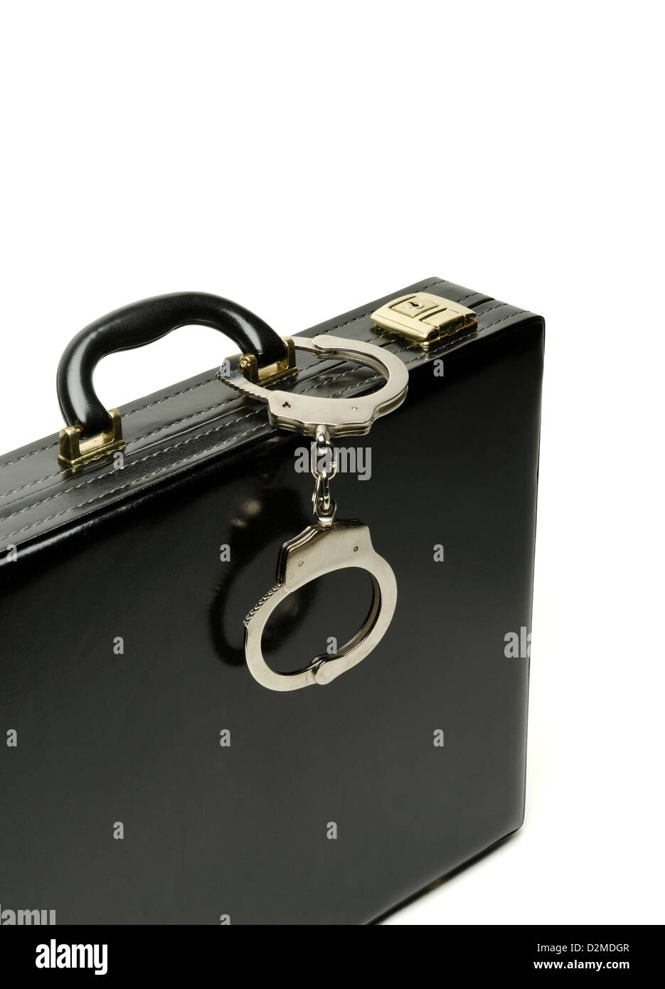 Briefcase and handcuffs Stock Photo Alamy