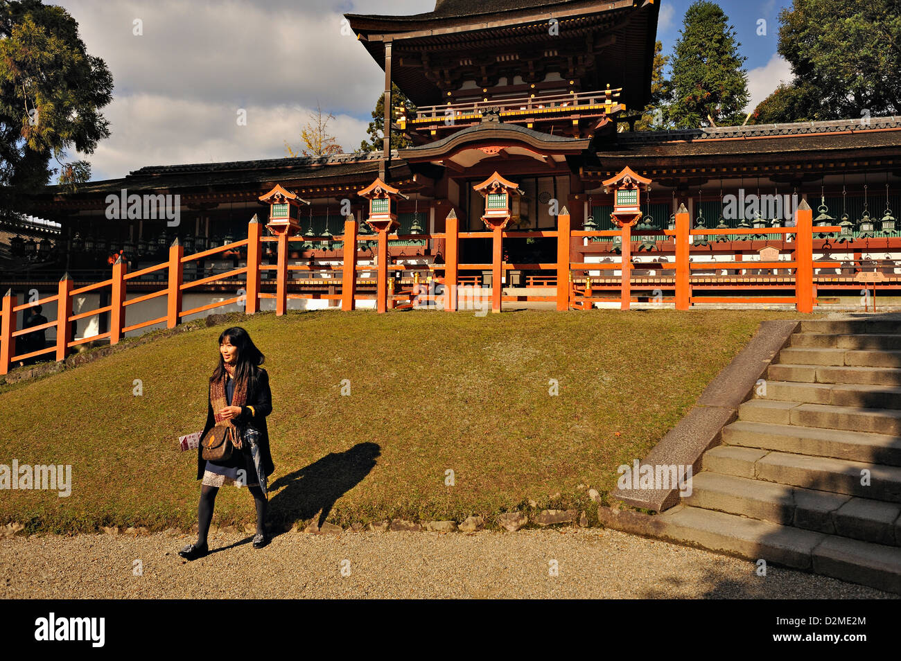 Posing for a photograph at Kasuga Taisha shrine in Nara, Japan Stock Photo