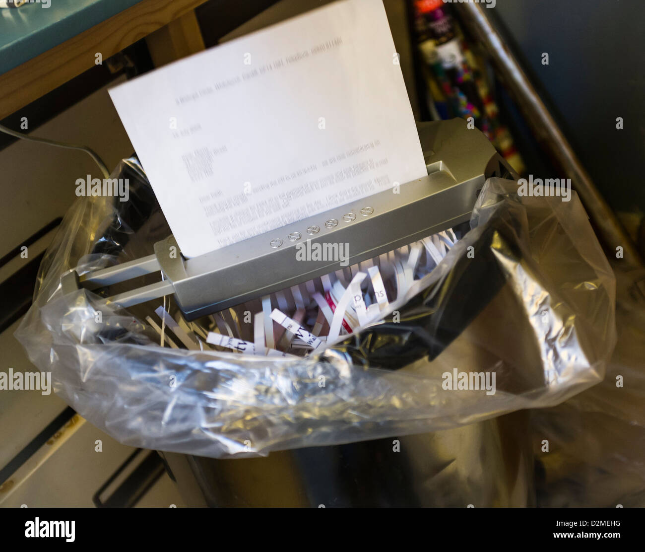 Shredding personal finance documents at home UK Stock Photo Alamy