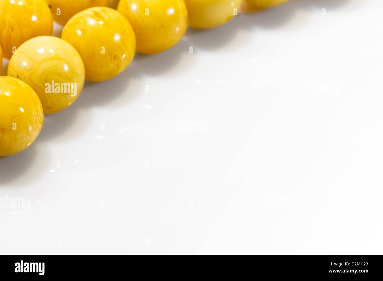 amber worry bead  background Stock Photo