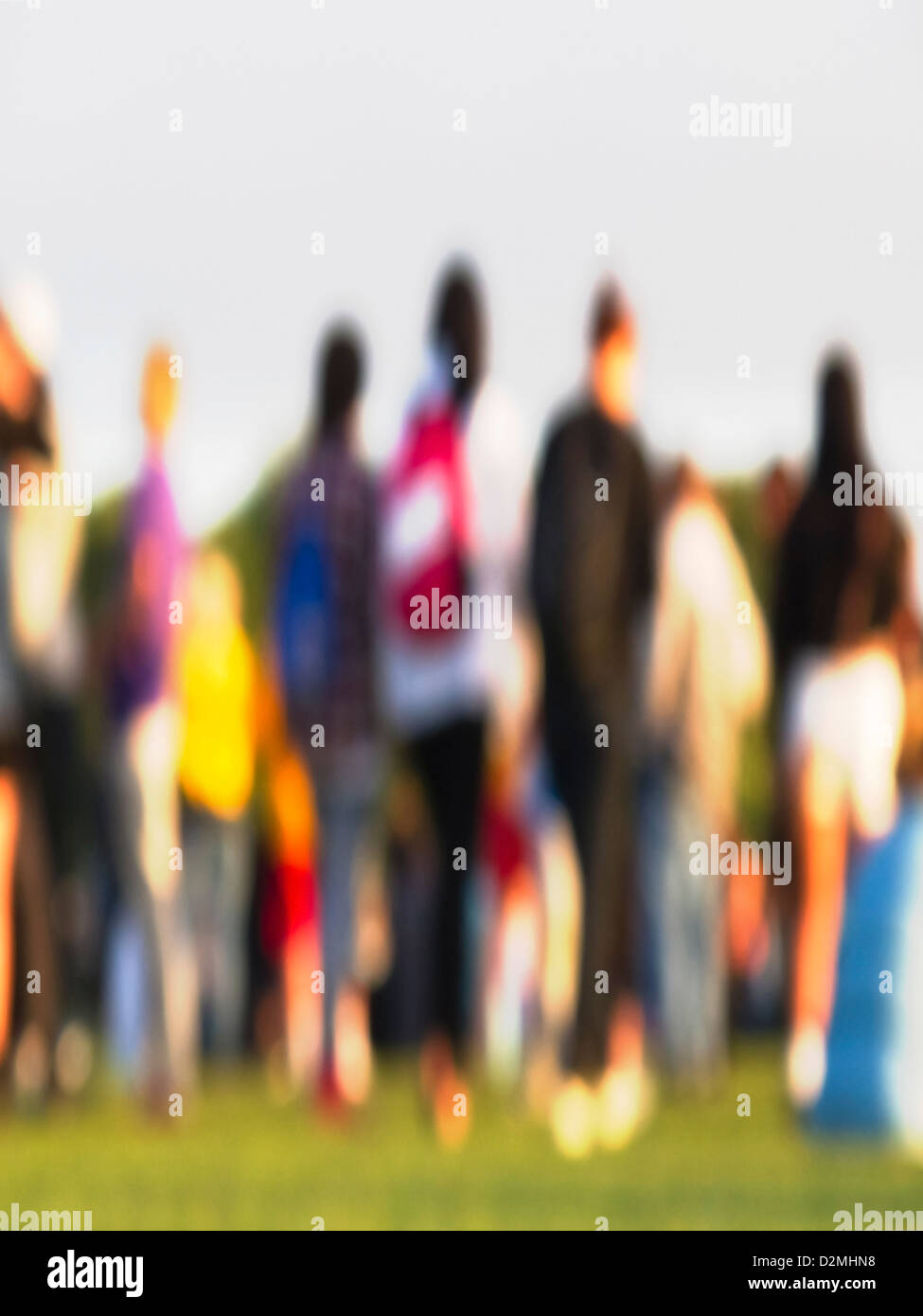 A group of people, de-focused, in Hagley Park, Christchurch, Canterbury, South Island, New Zealand. Stock Photo