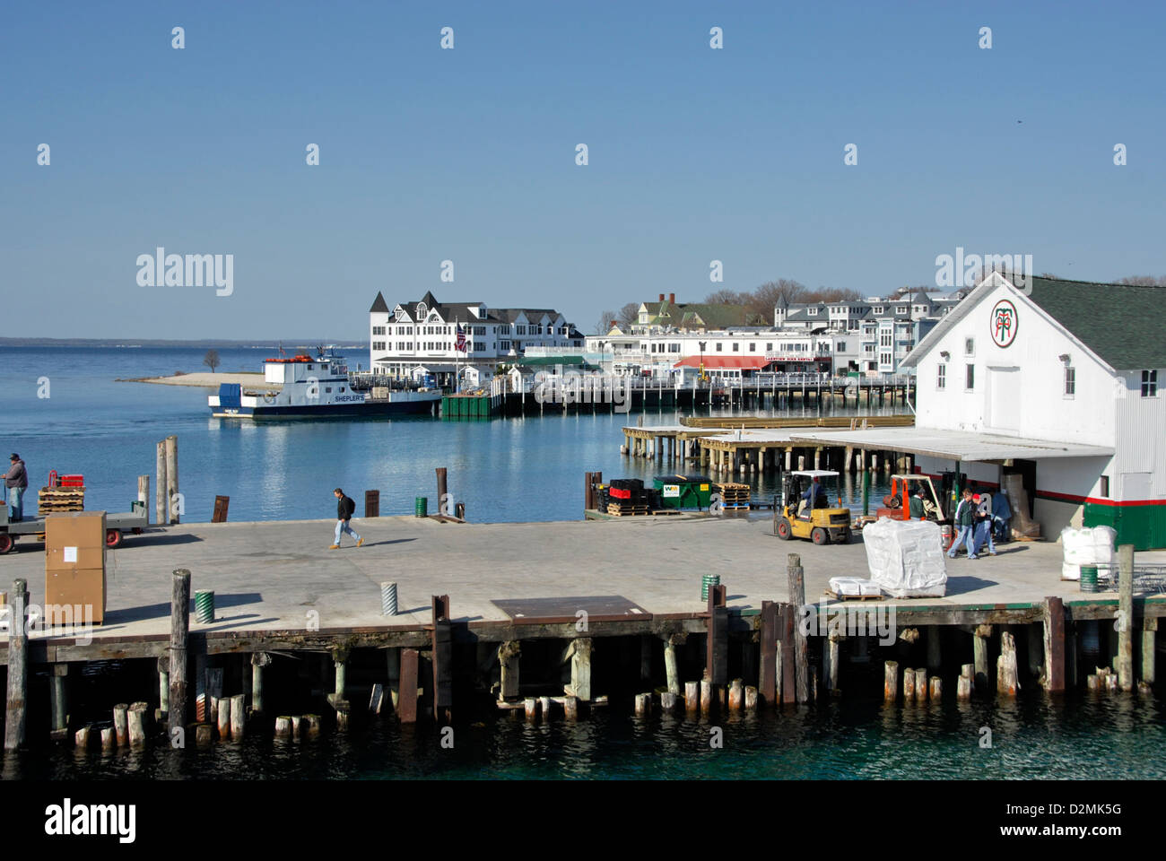 Ferry arrival pier on Mackinac Island,  Lake Huron, Michigan, USA Stock Photo