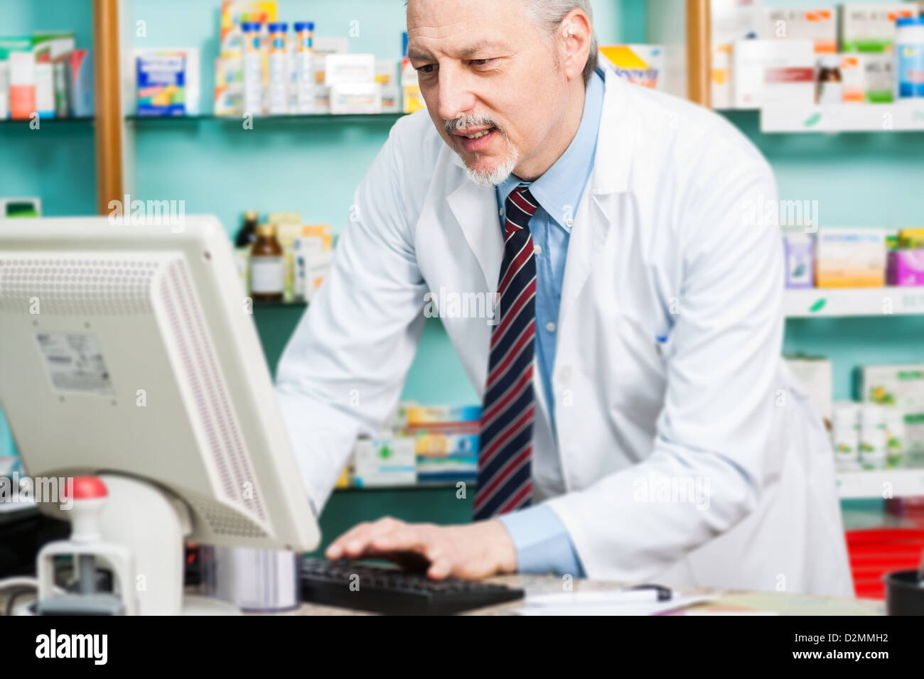 Farmacist Pharmacist at work in his pharmacy Stock Photo - Alamy