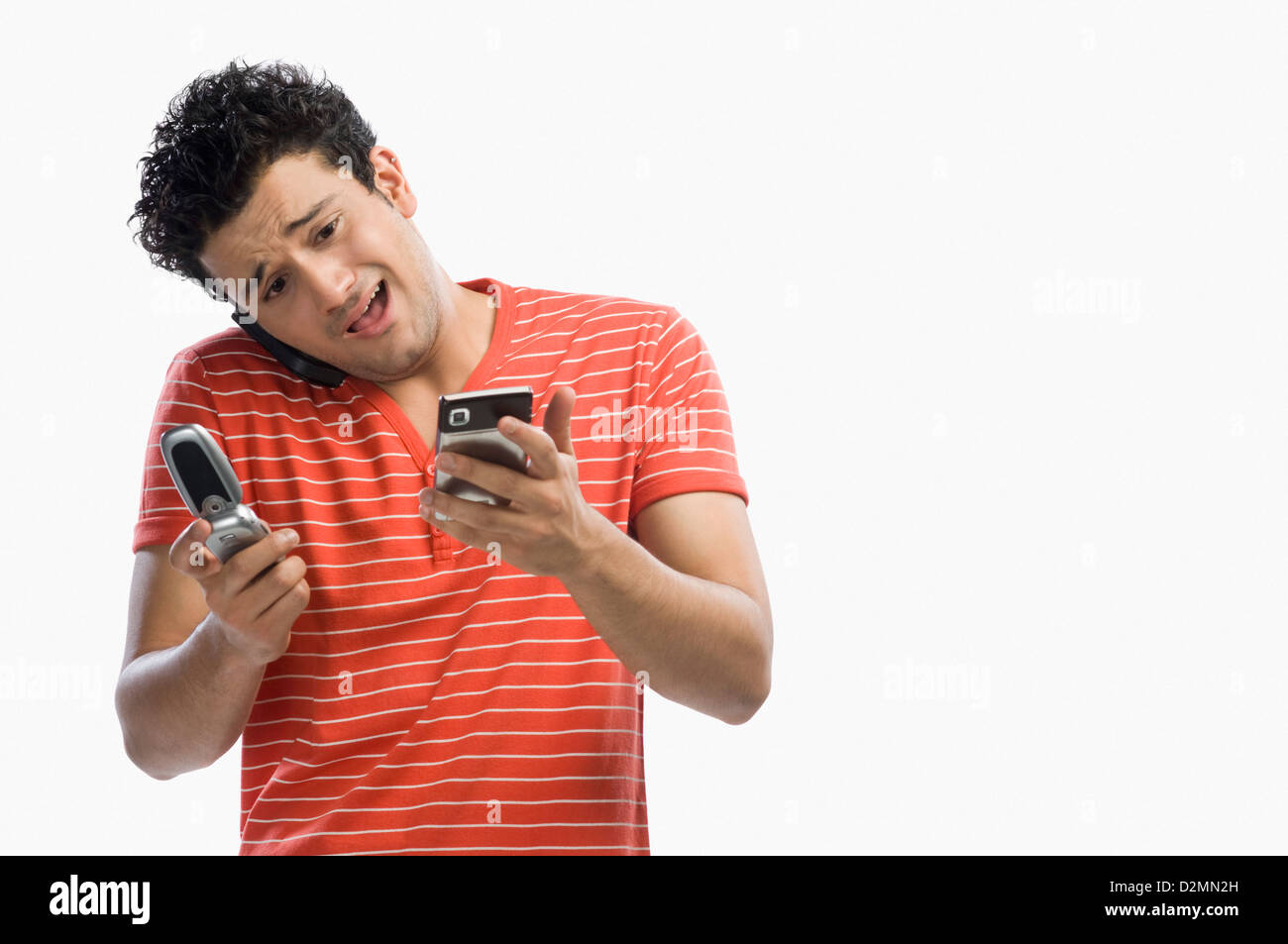Man using multiple mobile phones Stock Photo Alamy
