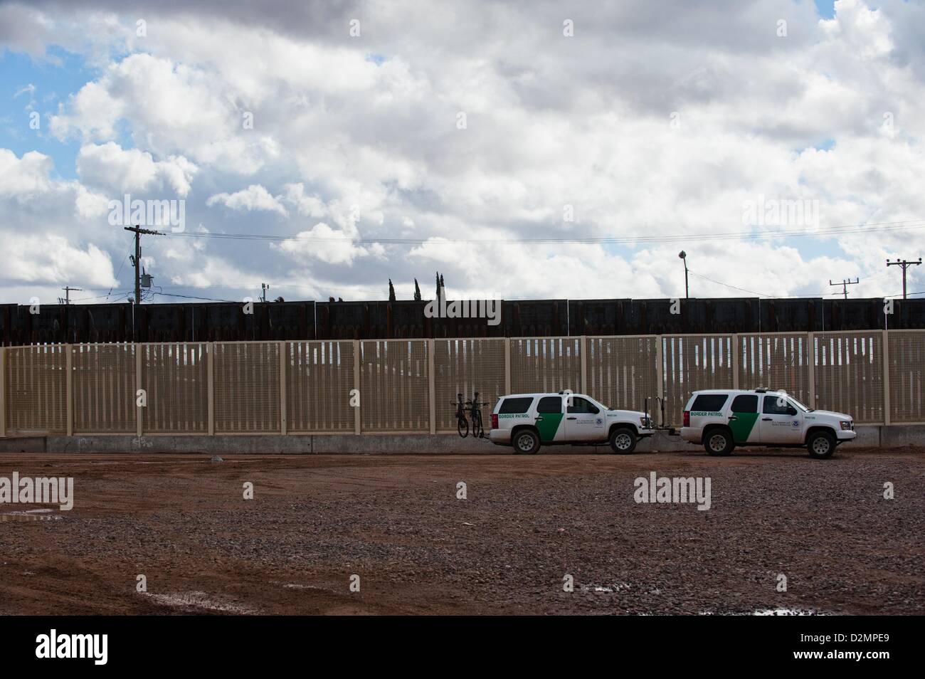 Jan. 28, 2013 Douglas, Arizona, U.S U.S. Border Patrol agents drive the fence in Douglas