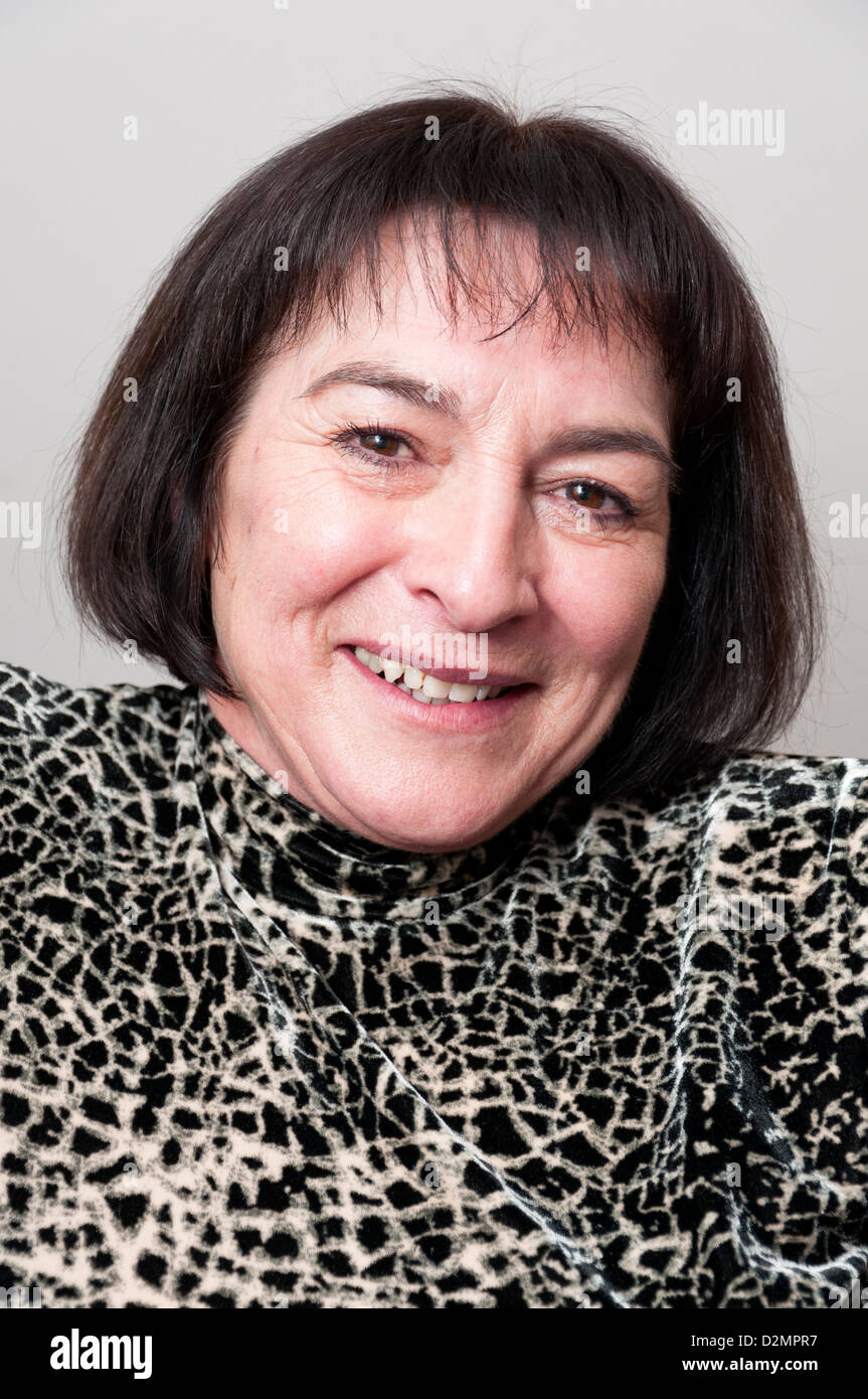Middle older woman smiling hi-res stock photography and images - Alamy