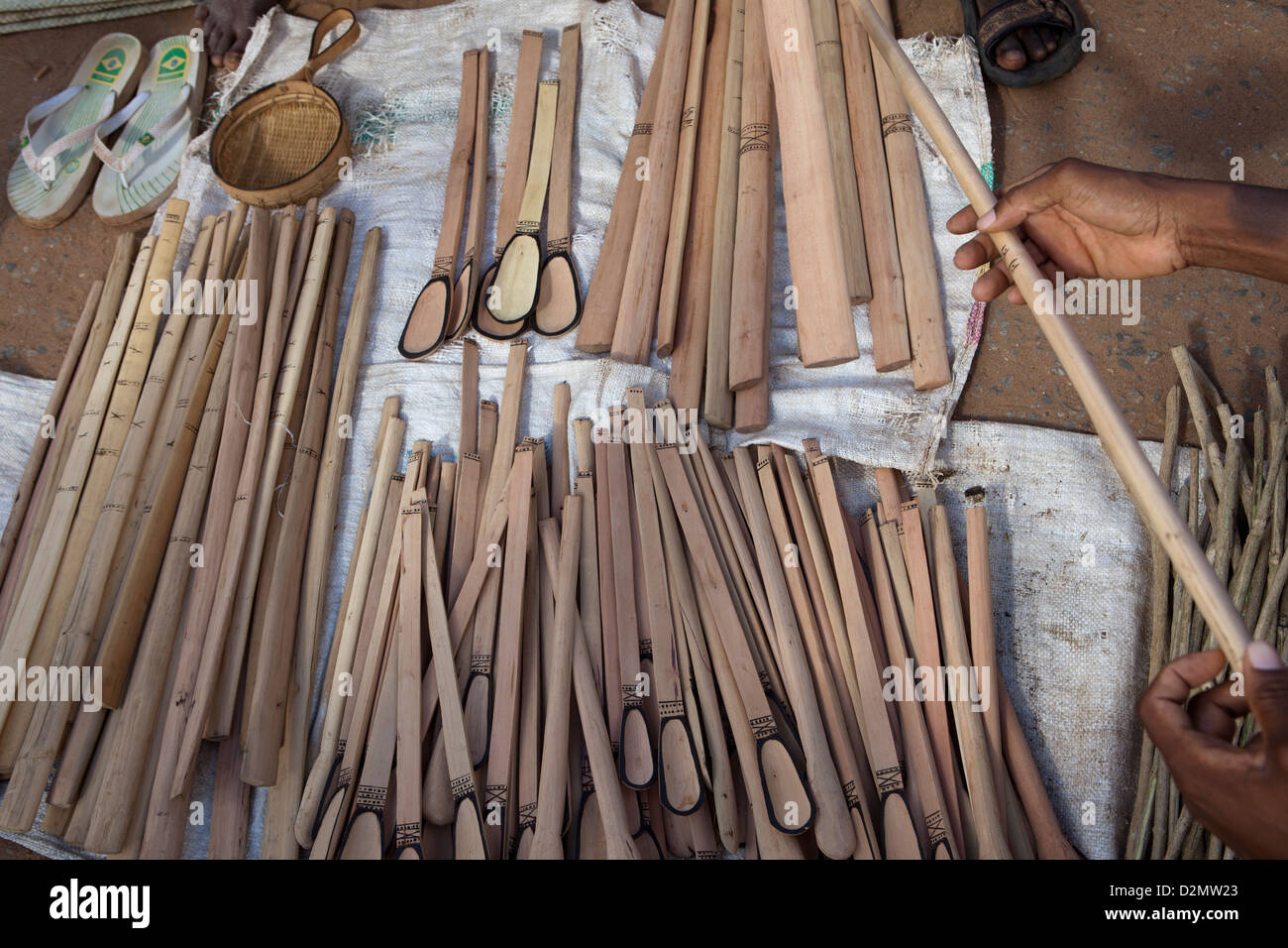 NAMPULA, MOZAMBIQUE, May 2010 : Sunday Market - wooden cooking spoons and stirrers. Photo by Mike Goldwater Stock Photo