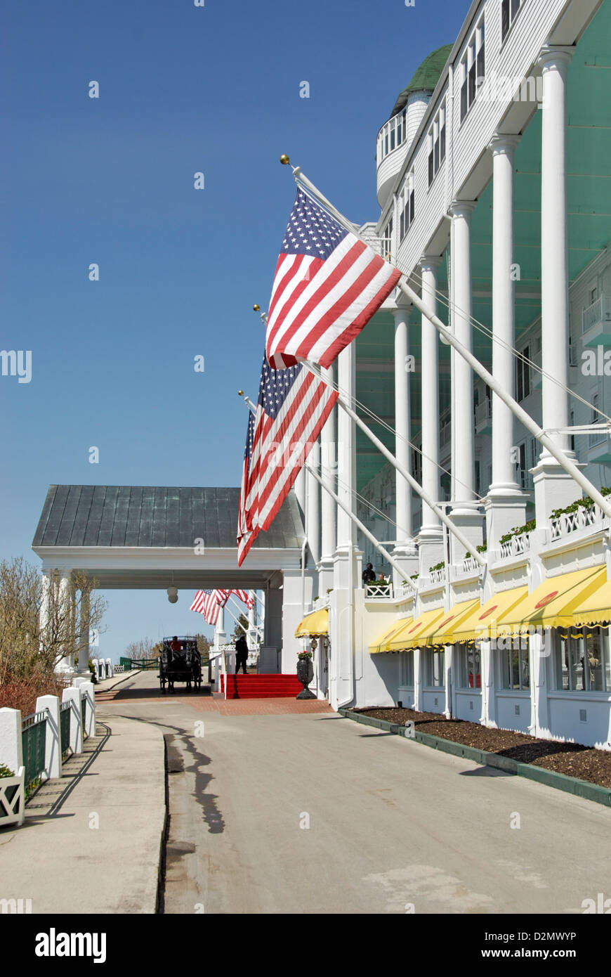 Porte cochere with horse-drawn carriage at Grand Hotel, Mackinac Island,  Lake Huron, Michigan, USA Stock Photo