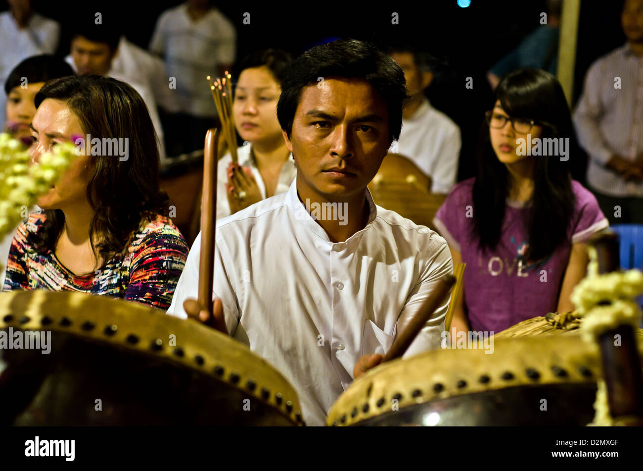 Man playing drums at Dorngkeur Buddhist shrine in front of the Royal Palace,Phnom Penh,Cambodia Stock Photo