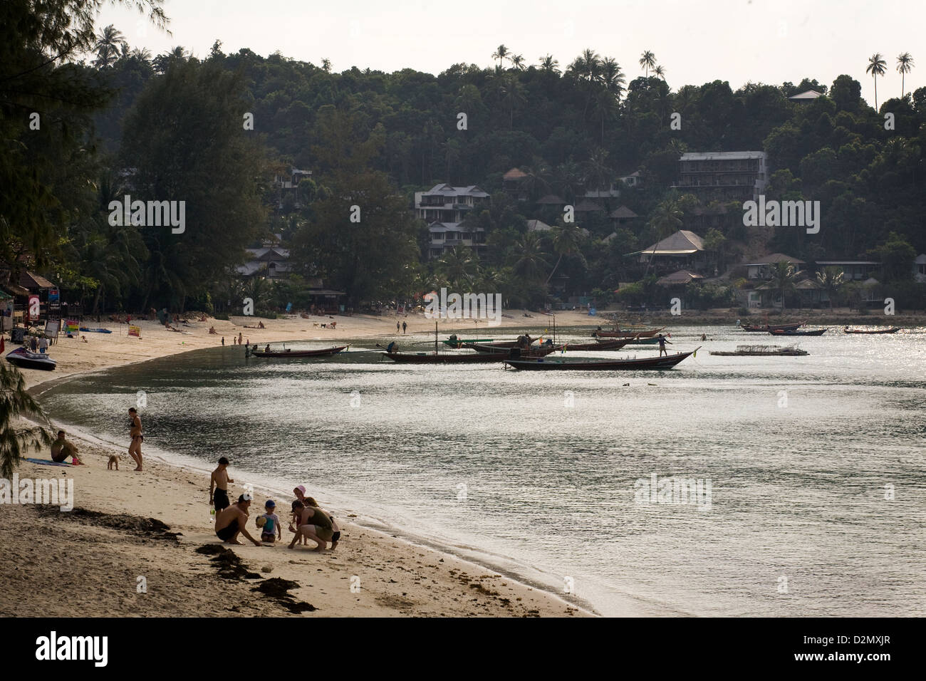 Tourists on the beach at Chaloklum , Koh Phangan , Thailand Stock Photo