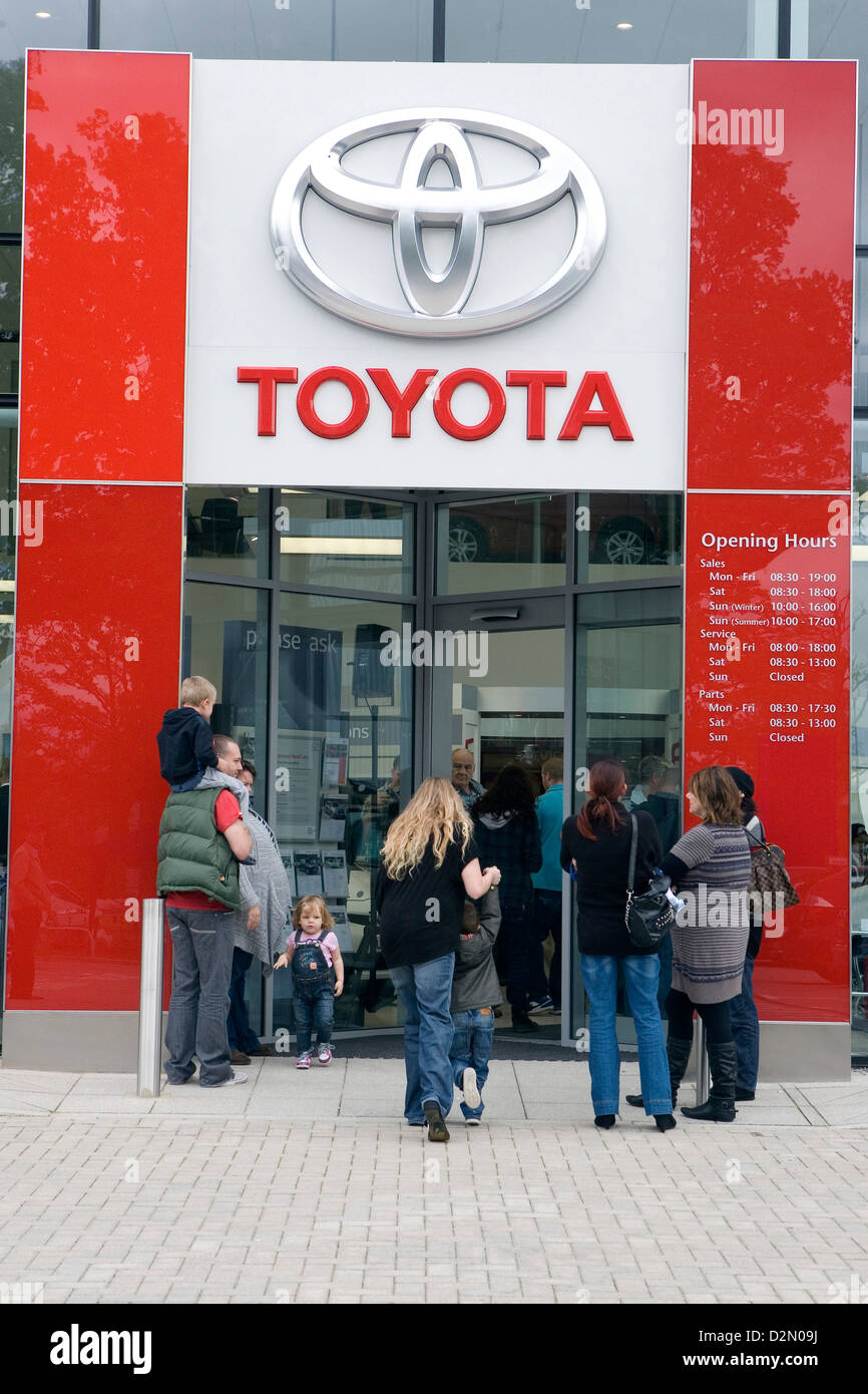 People entering into a Toyota dealership Stock Photo Alamy