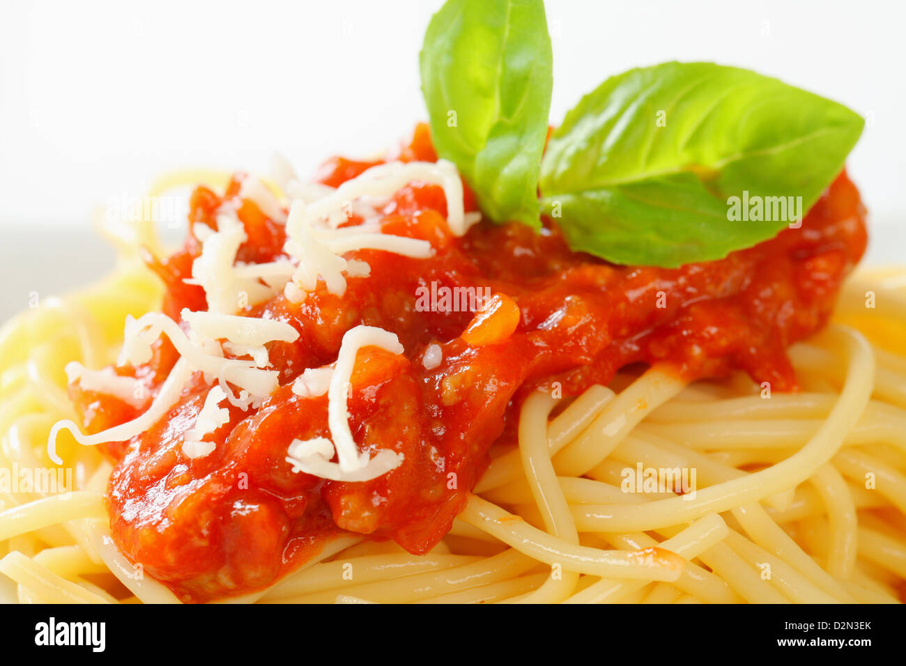 Spaghetti with meat-based tomato sauce and cheese Stock Photo