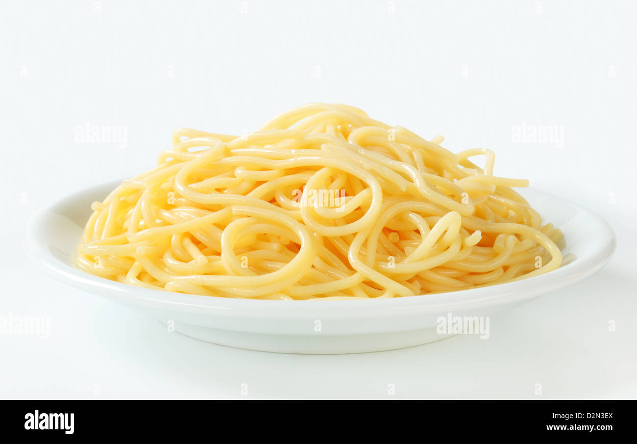 Studio shot of boiled spaghetti on plate Stock Photo
