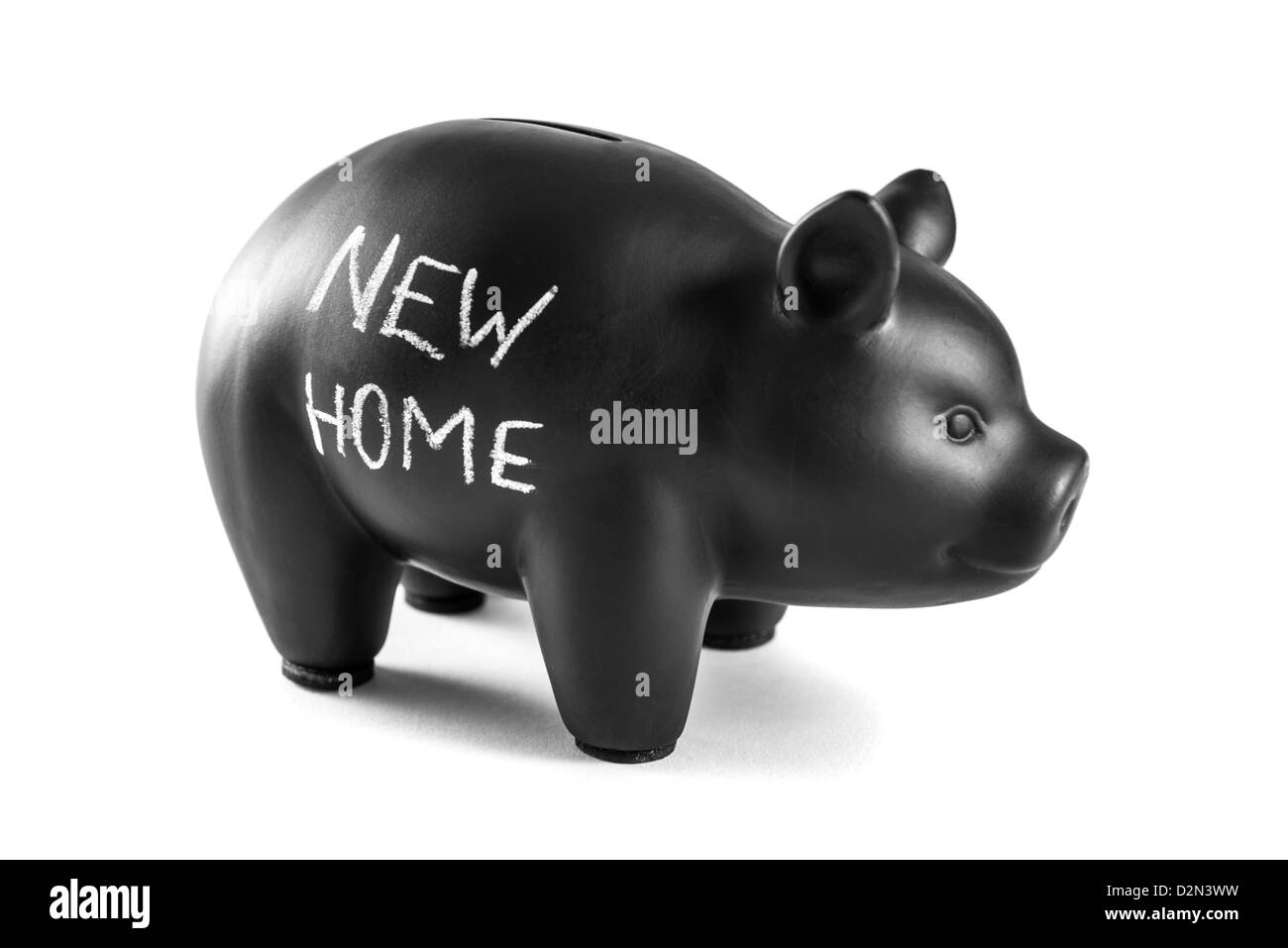 Black piggy bank on white background with 'new home' written on it ...