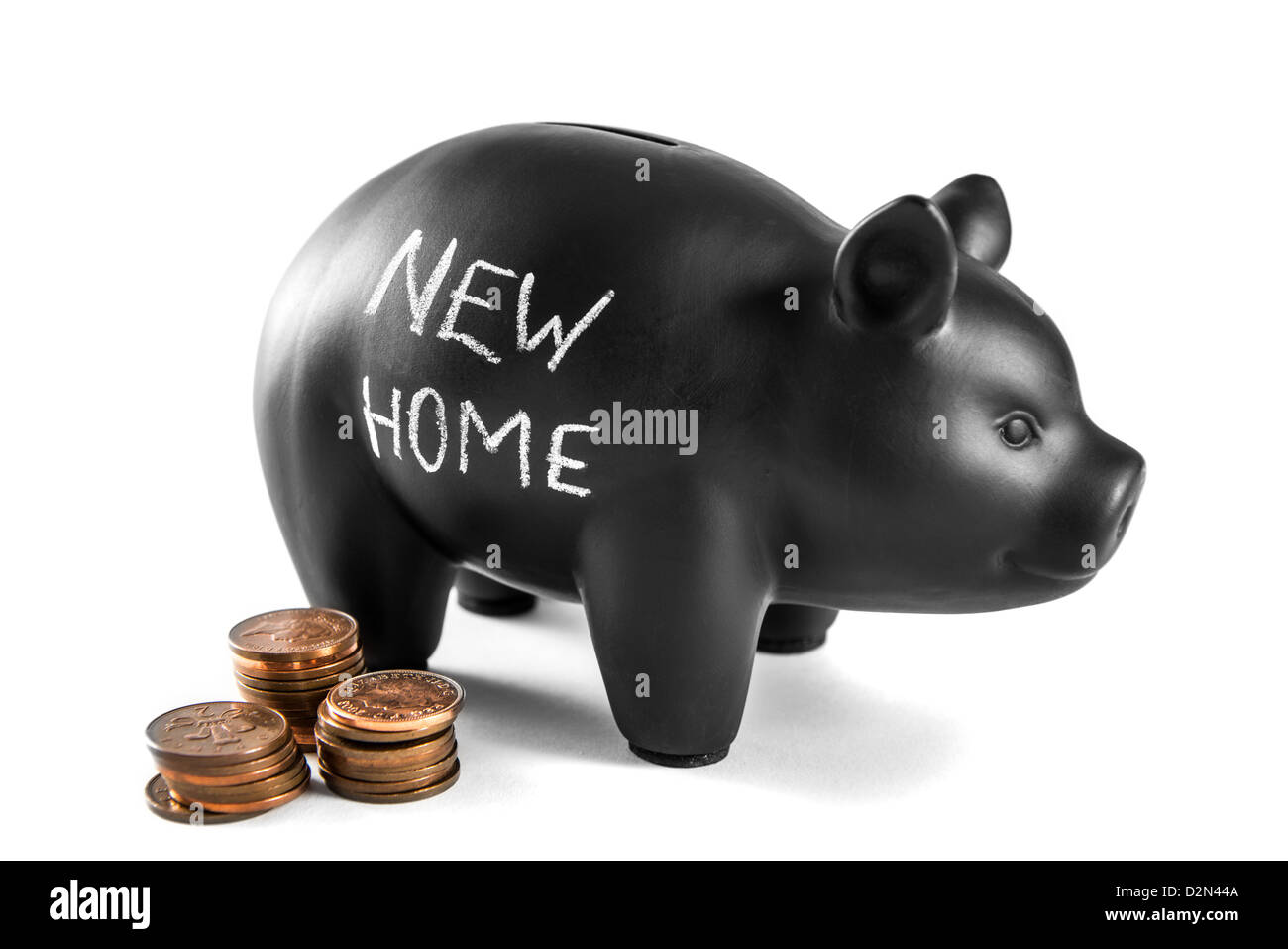 Black piggy bank on white background with 'new home' written on it and ...