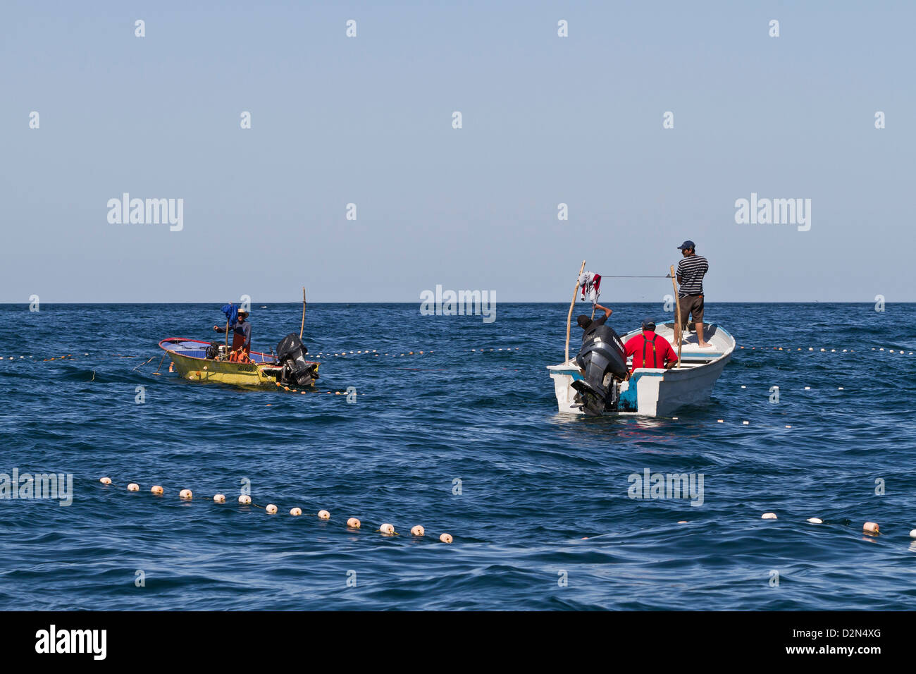 Panga fisherman setting nets, Isla San Marcos, Gulf of California (Sea