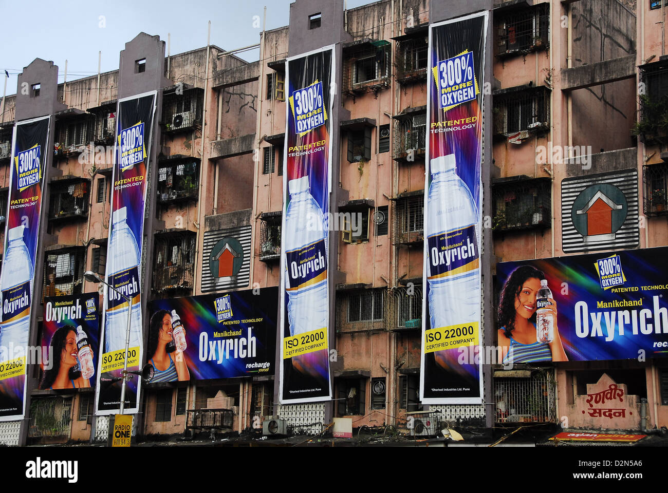 Advertisements on apartment buildings of Mumbai, Maharashtra, India, Asia Stock Photo