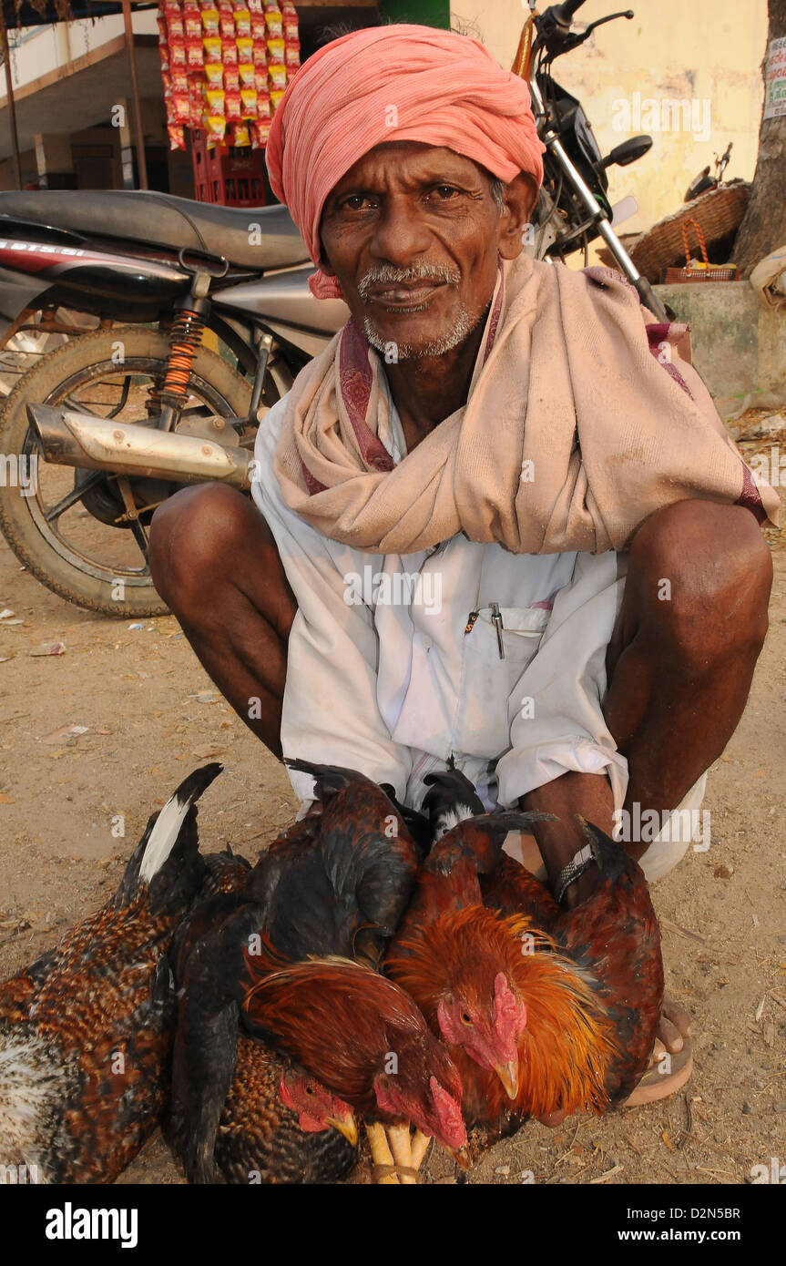 Chicken seller in rural India, Maralwadi, Karnataka, India, Asia Stock Photo