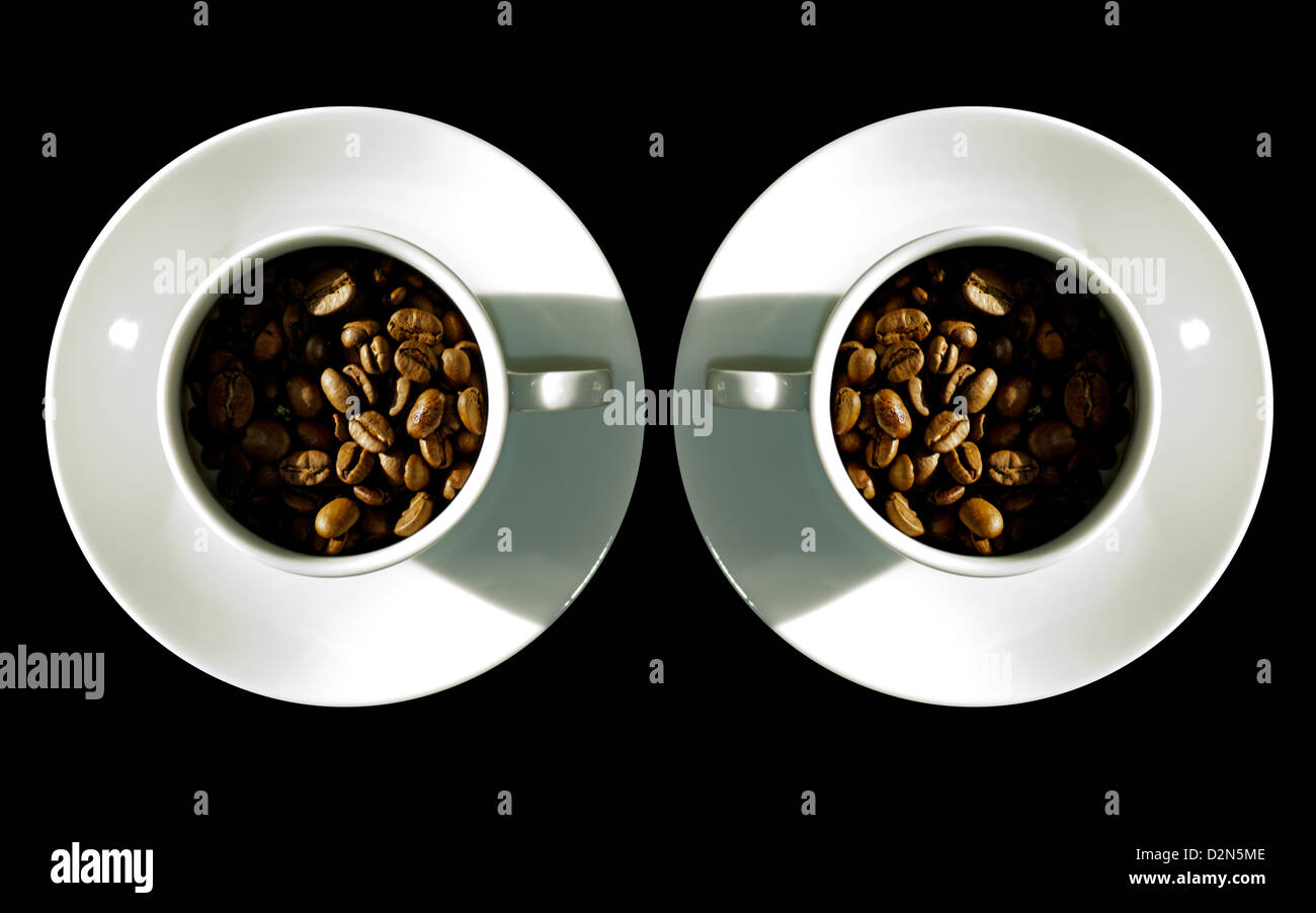 Double espresso coffee beans in espresso cups Stock Photo Alamy