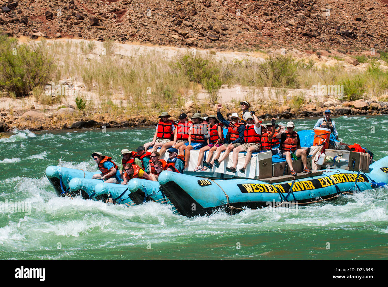 Rafting down the Colorado River through turbulent waters of the Grand Canyon, Arizona, United 