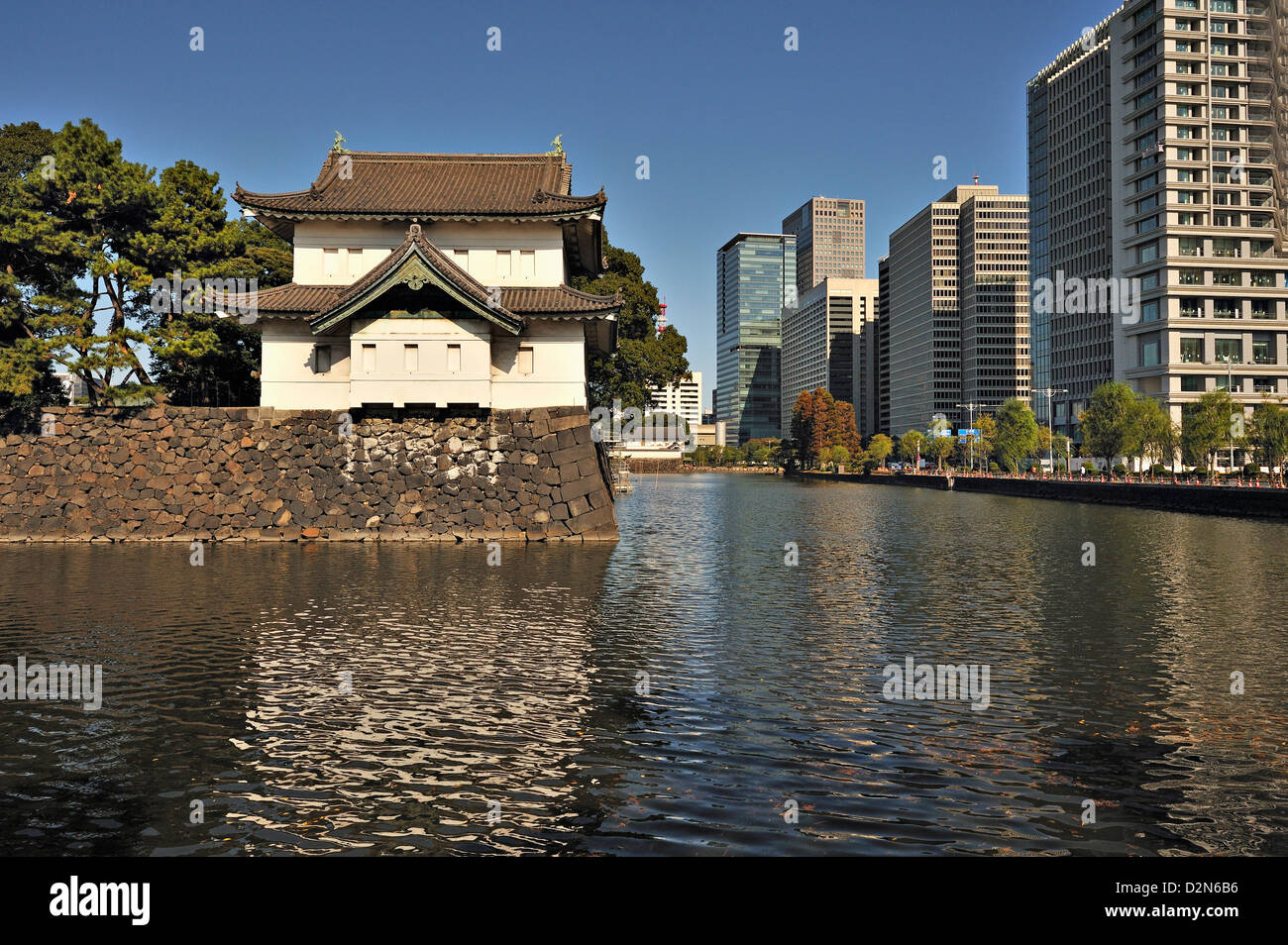 Guardhouse, wall and moat of the Japanese Imperial Palace, seen from Hibiya Park, Tokyo, Japan Stock Photo
