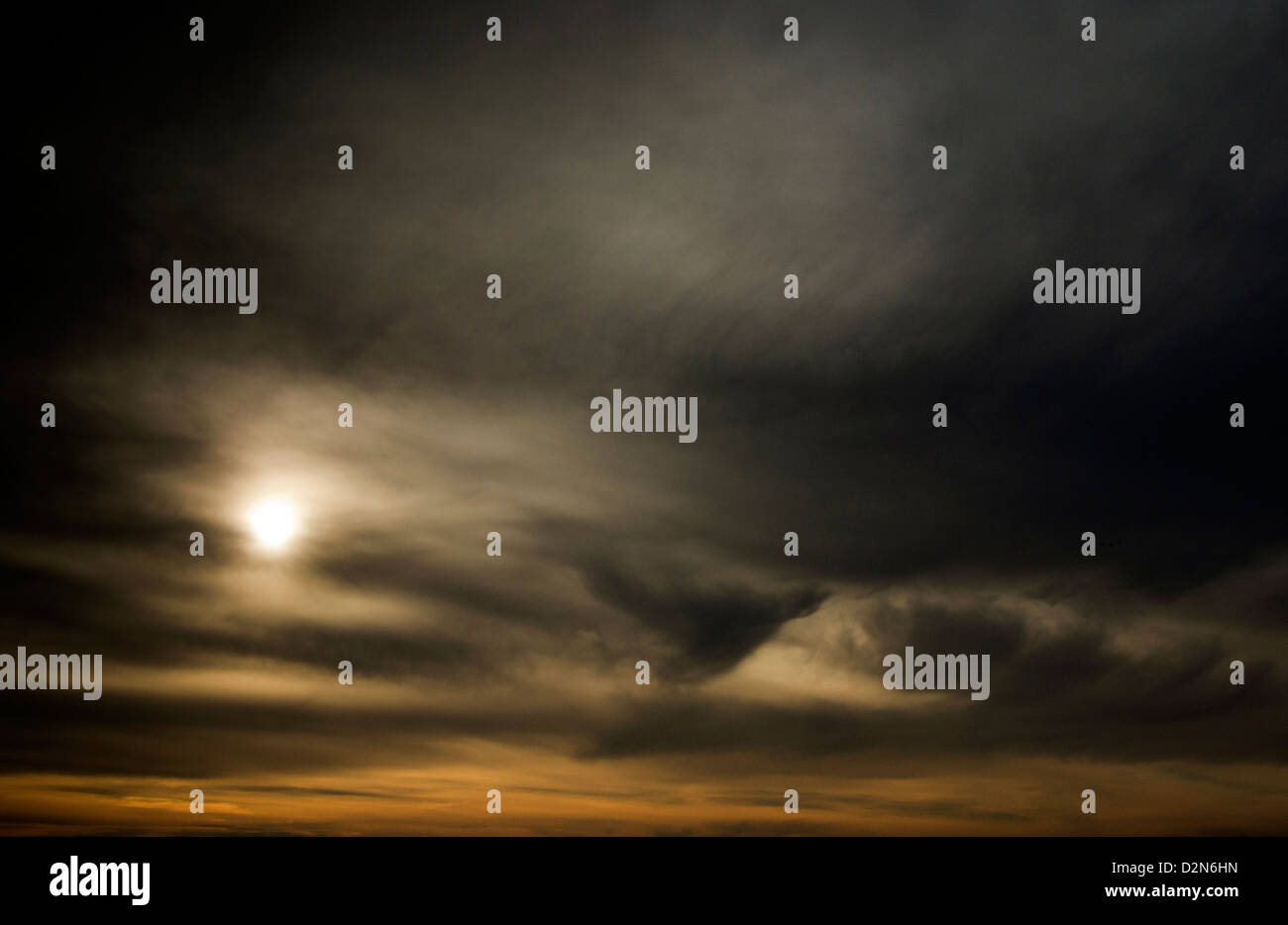 Sun through stormy clouds hi-res stock photography and images - Alamy