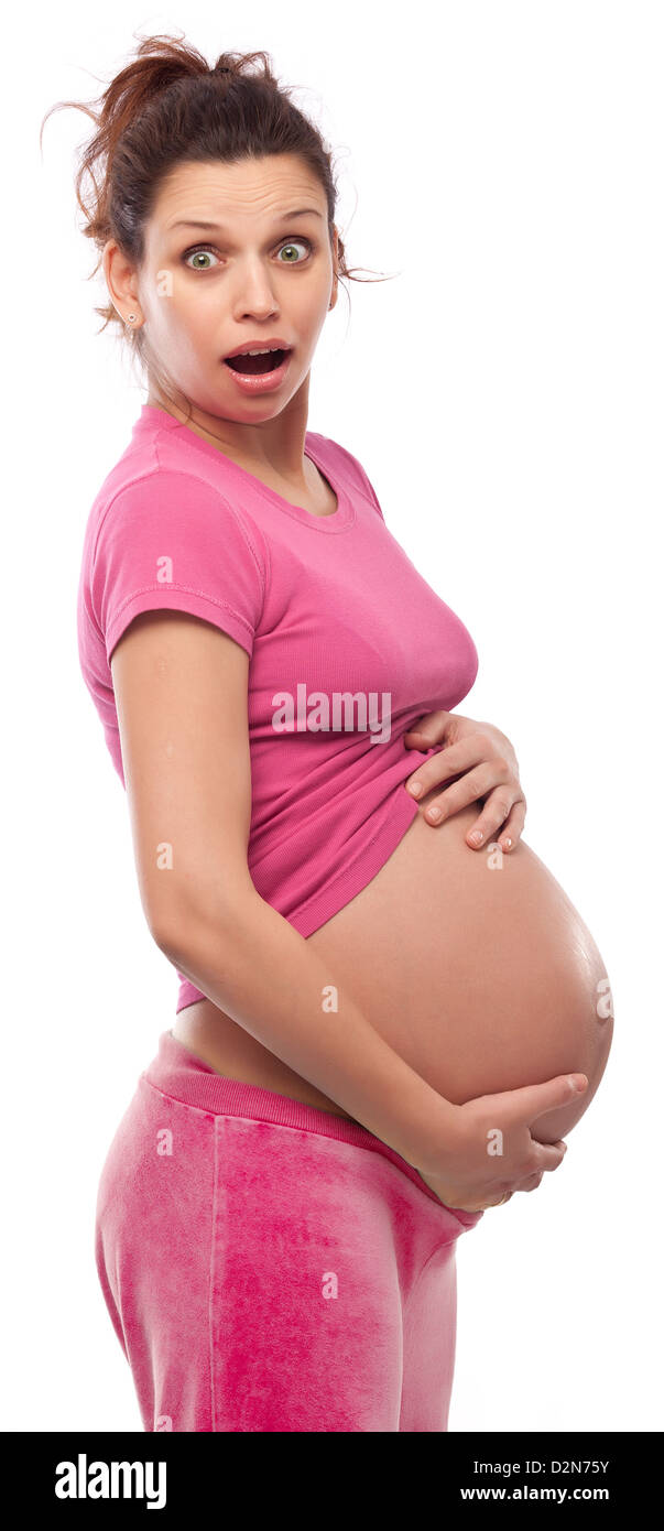 Happy pregnant woman keeping hands on her belly Stock Photo - Alamy