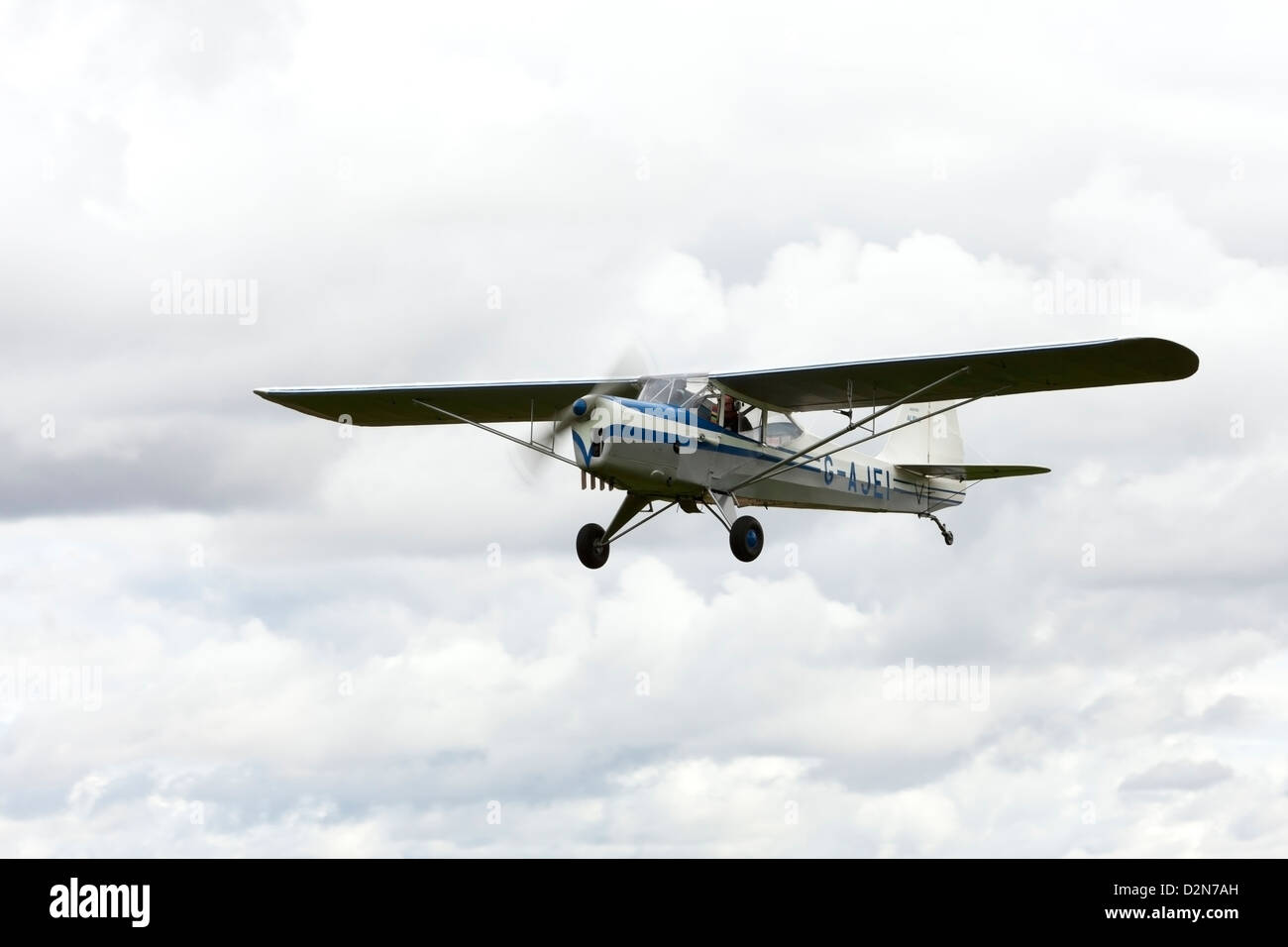 Auster J1N Alpha G-AJEI in flight after take-off from Breighton Airfield Stock Photo