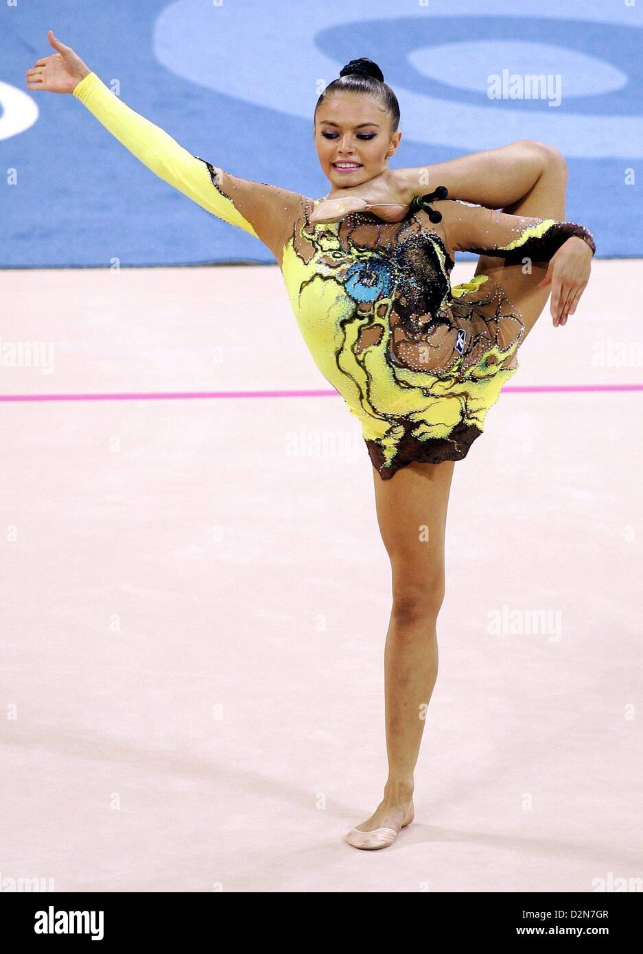 (FILE) An archive photo dated 27 August 2004 shows Russia's Alina Kabaeva performs with the clubs during the rhythmic gymnastics combined qualifications in Athens, Greece. She was a two-time world champion and won bronze in Sydney. She was later banned for doping. Photo: Gero Breloer Stock Photo