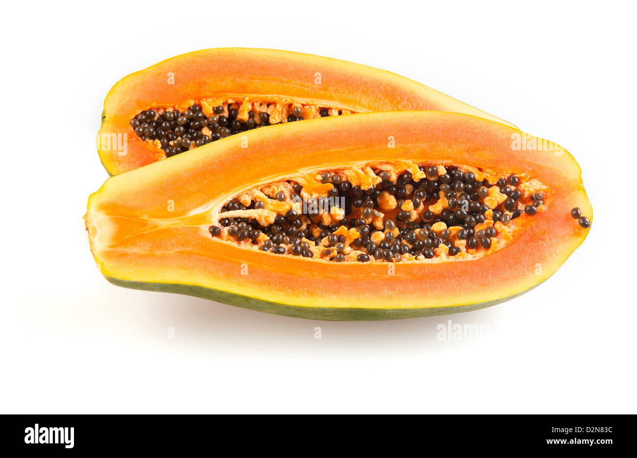 Halved fresh papaya fruit isolated on white background Stock Photo