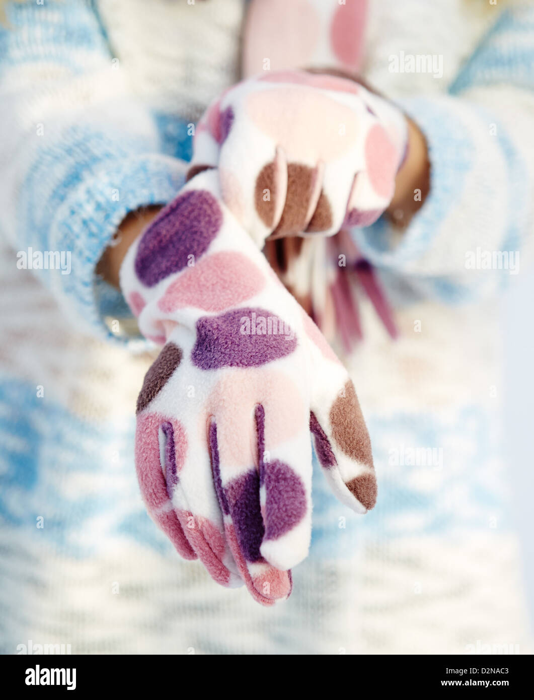 Girl wearing gloves outdoors Stock Photo Alamy