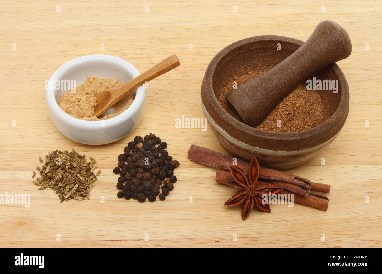 Ingredients for Chinese five spice with a ramekin and pestle and mortar