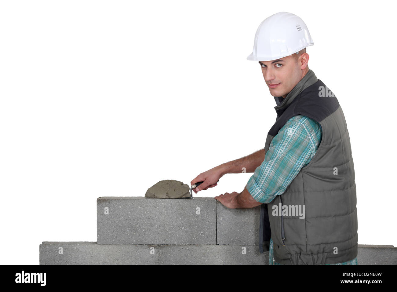 Red cement mix and trowel on the construction site Stock Photo - Alamy