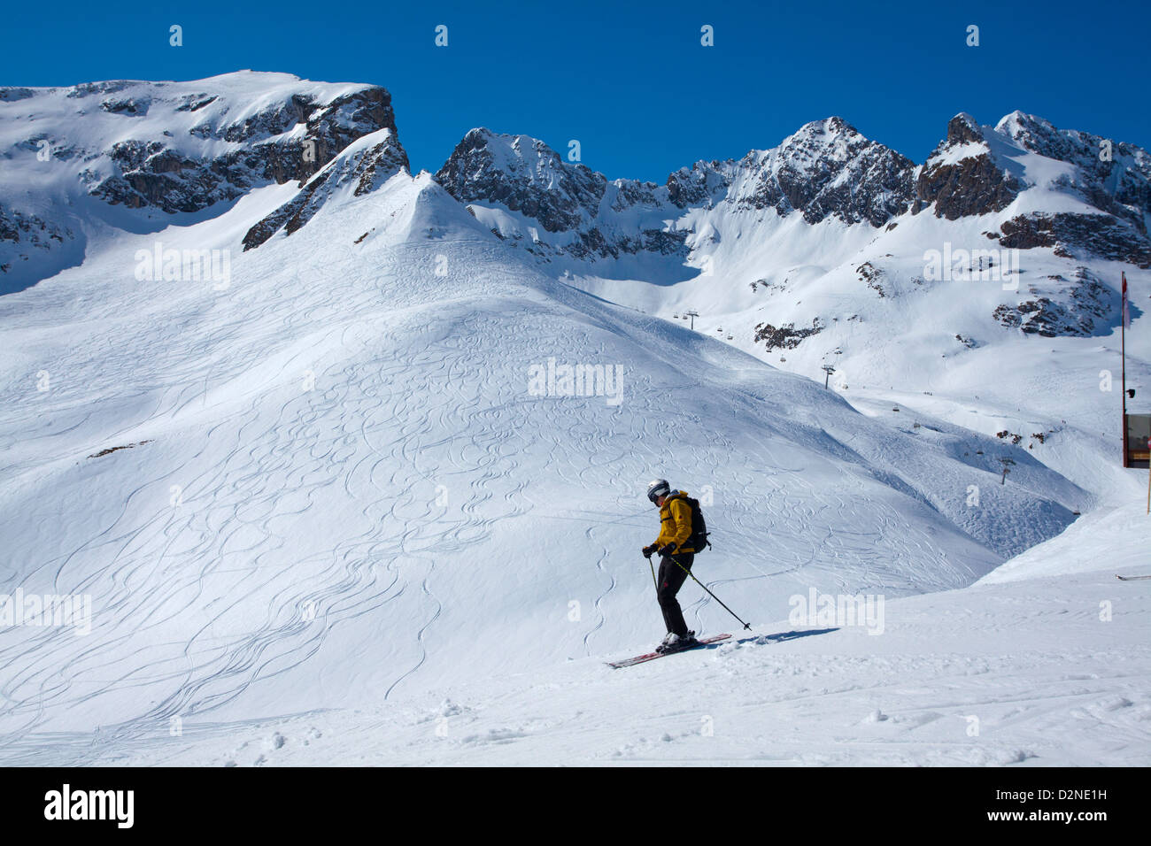 Skiing on the pistes above Zurs, Arlberg, Austria. Stock Photo