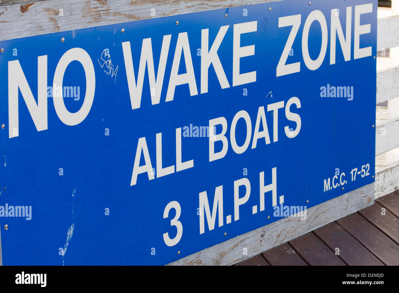 No Wake Zone All Boats 3 MPH sign found at Old Fisherman's Wharf, Monterey, CA Stock Photo