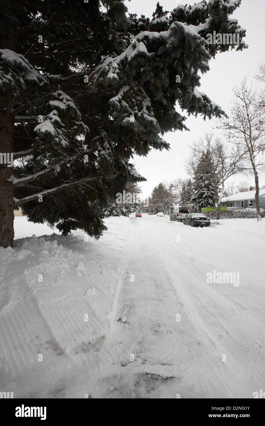 snow covered residential street in Regina Saskatchewan Canada Stock