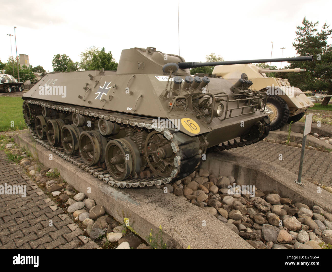 The HS 30 'SPZ Lang' is a German armored personnel carrier developed in the 1960s. It was designed for troop transport and battlefield operations, offering protection and mobility in military combat environments. It features a fully tracked chassis and is armed for defense purposes. Stock Photo