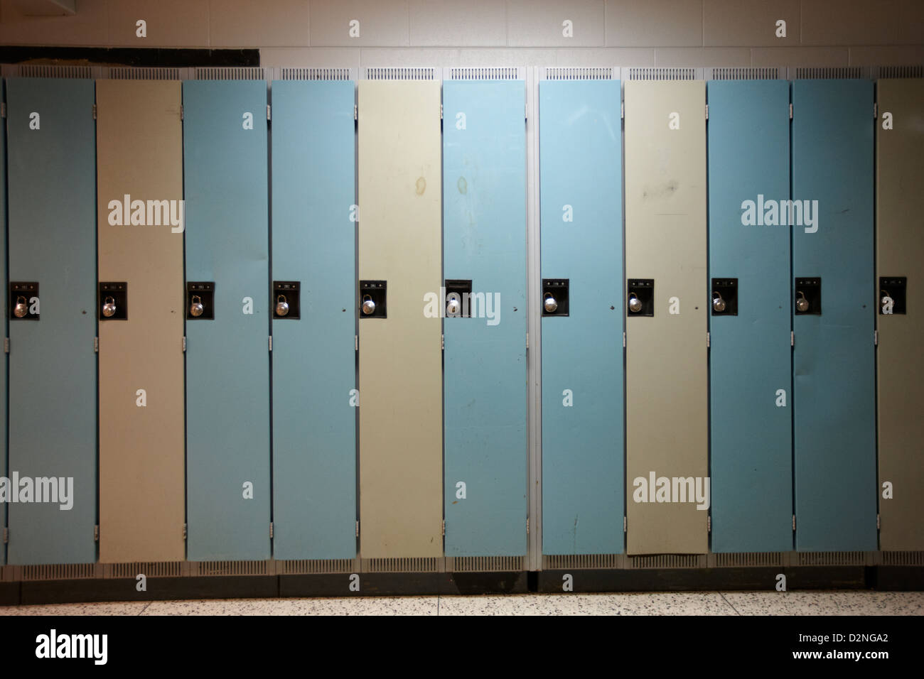 row of locked school lockers in empty corridor of High school canada