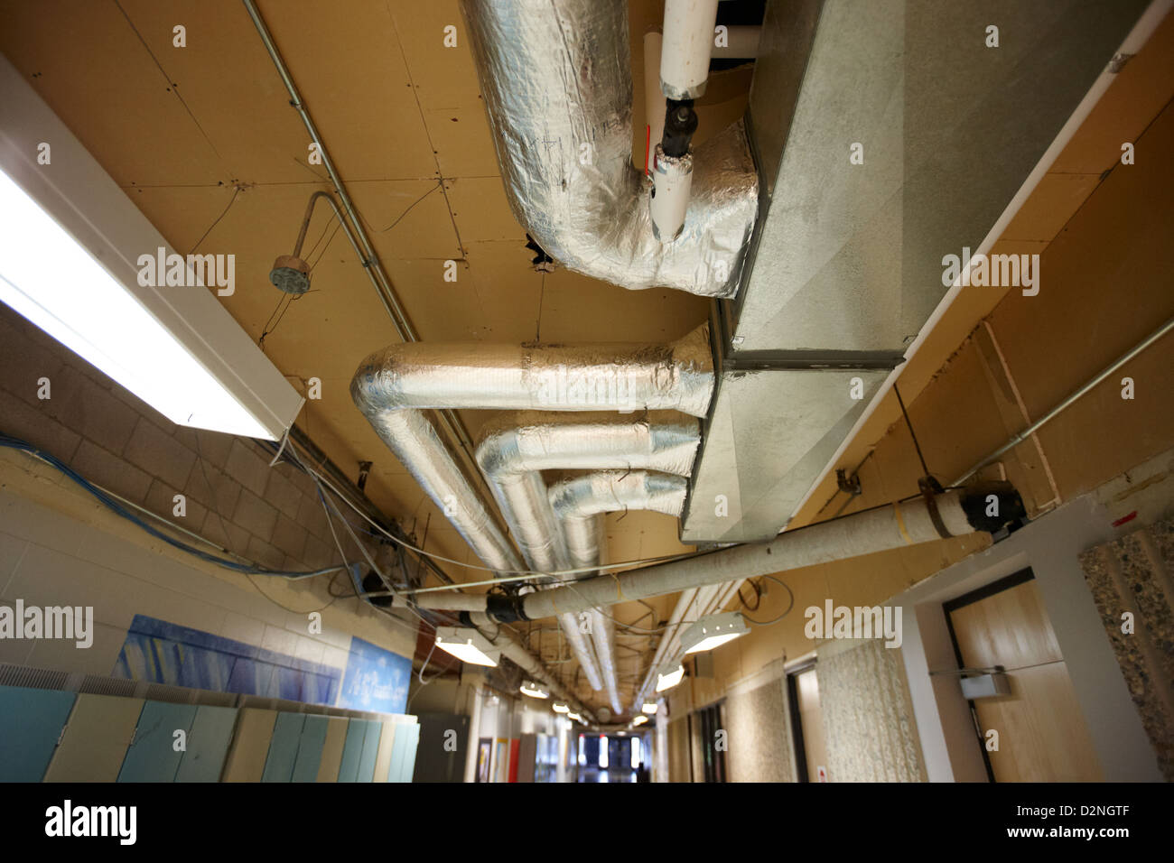 exposed insulated heating and ventilation ducts High school canada north america Stock Photo