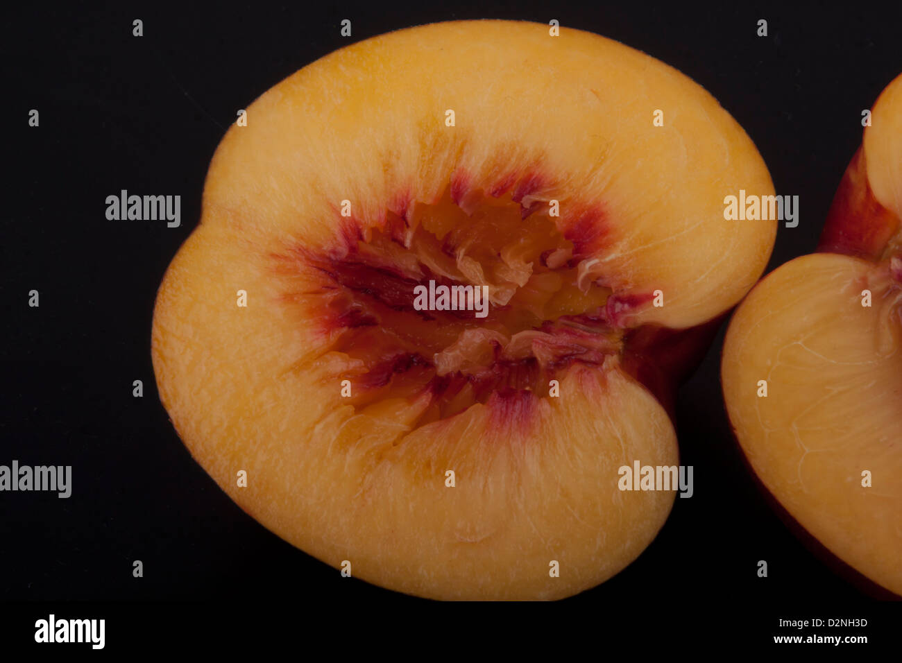 photo of peaches on a black background Stock Photo