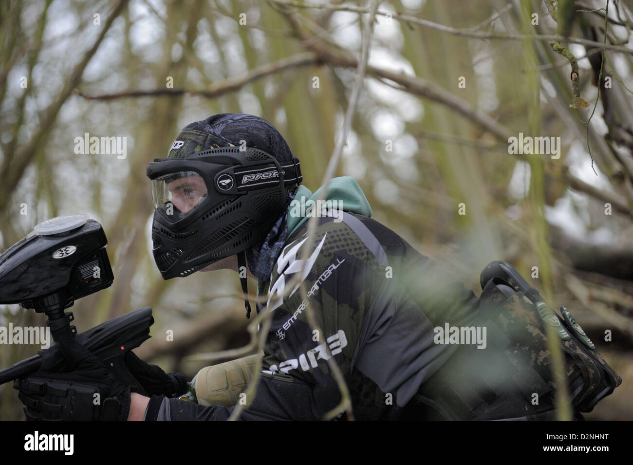 Paintball in Winter woodlands Stock Photo