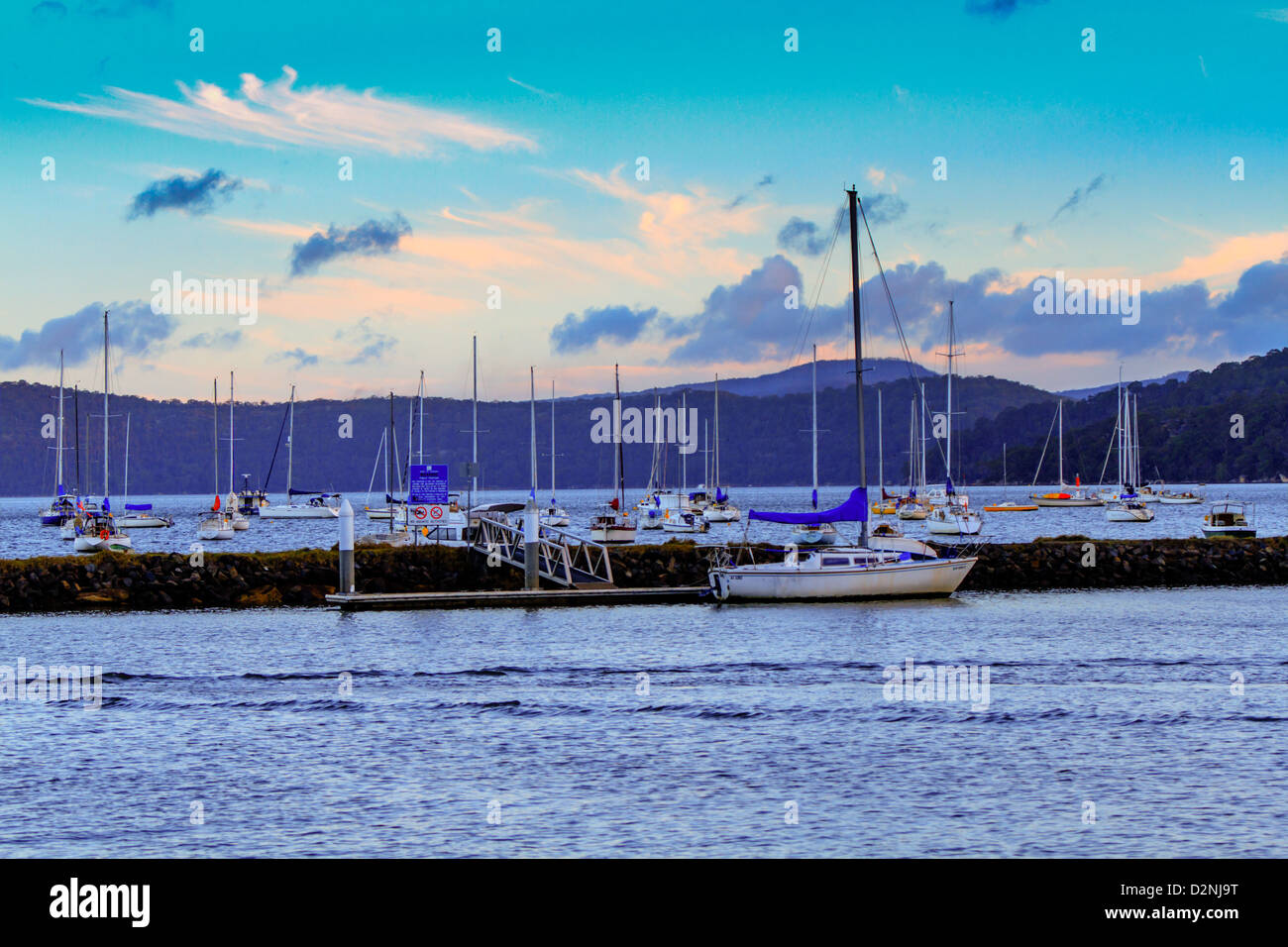 Boats in Parsleys bay,  Brooklyn, NSW, Australia with beautiful clouds in the sky background Stock Photo