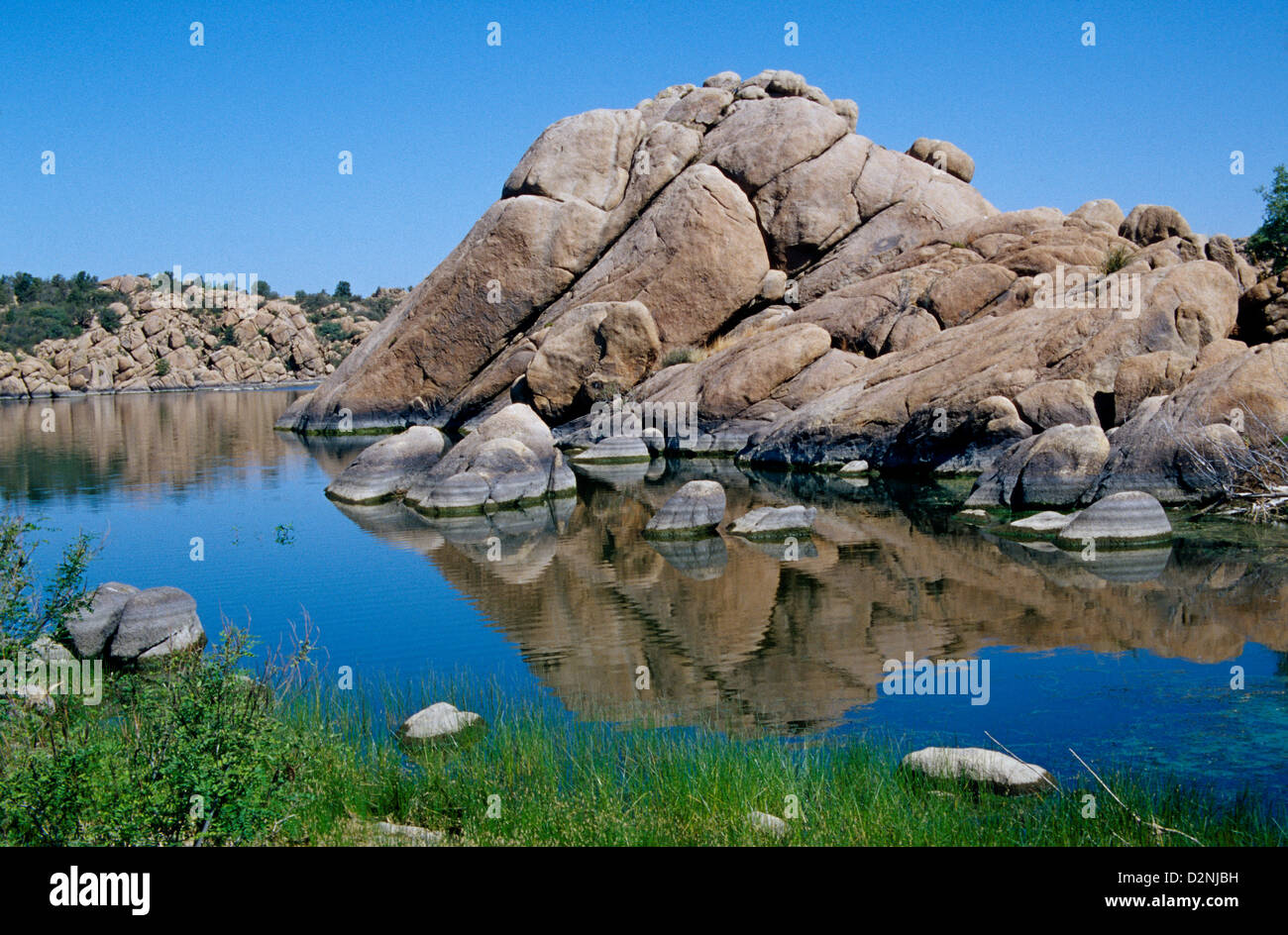 Granite boulders of every shape and size embrace the shores of Watson