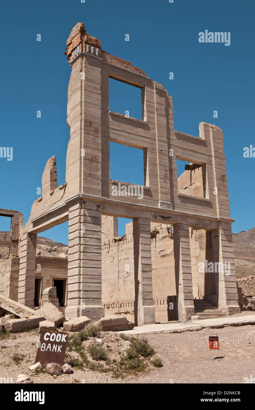 The crumbling remains of the Cook Bank in the ghost town of Rhyolite, Nevada. Stock Photo