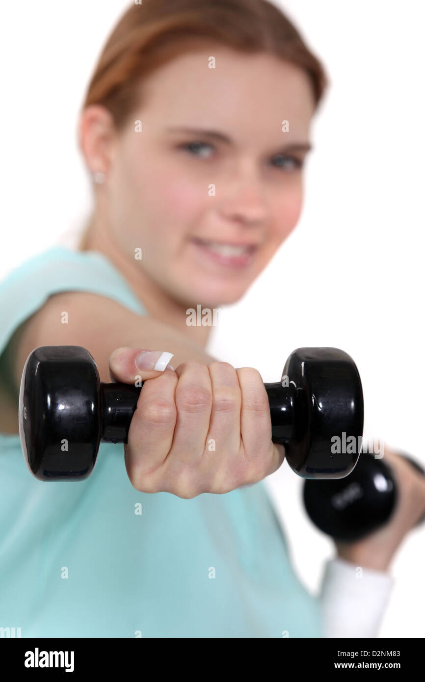 A woman lifting weights Stock Photo Alamy