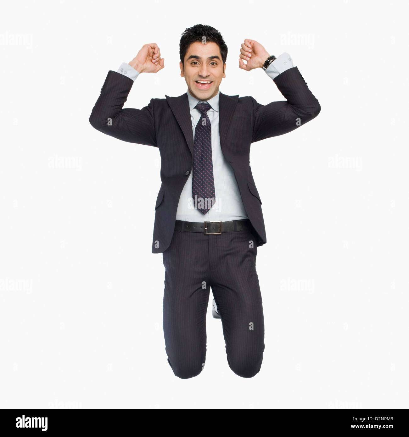 Portrait of a businessman cheering Stock Photo - Alamy