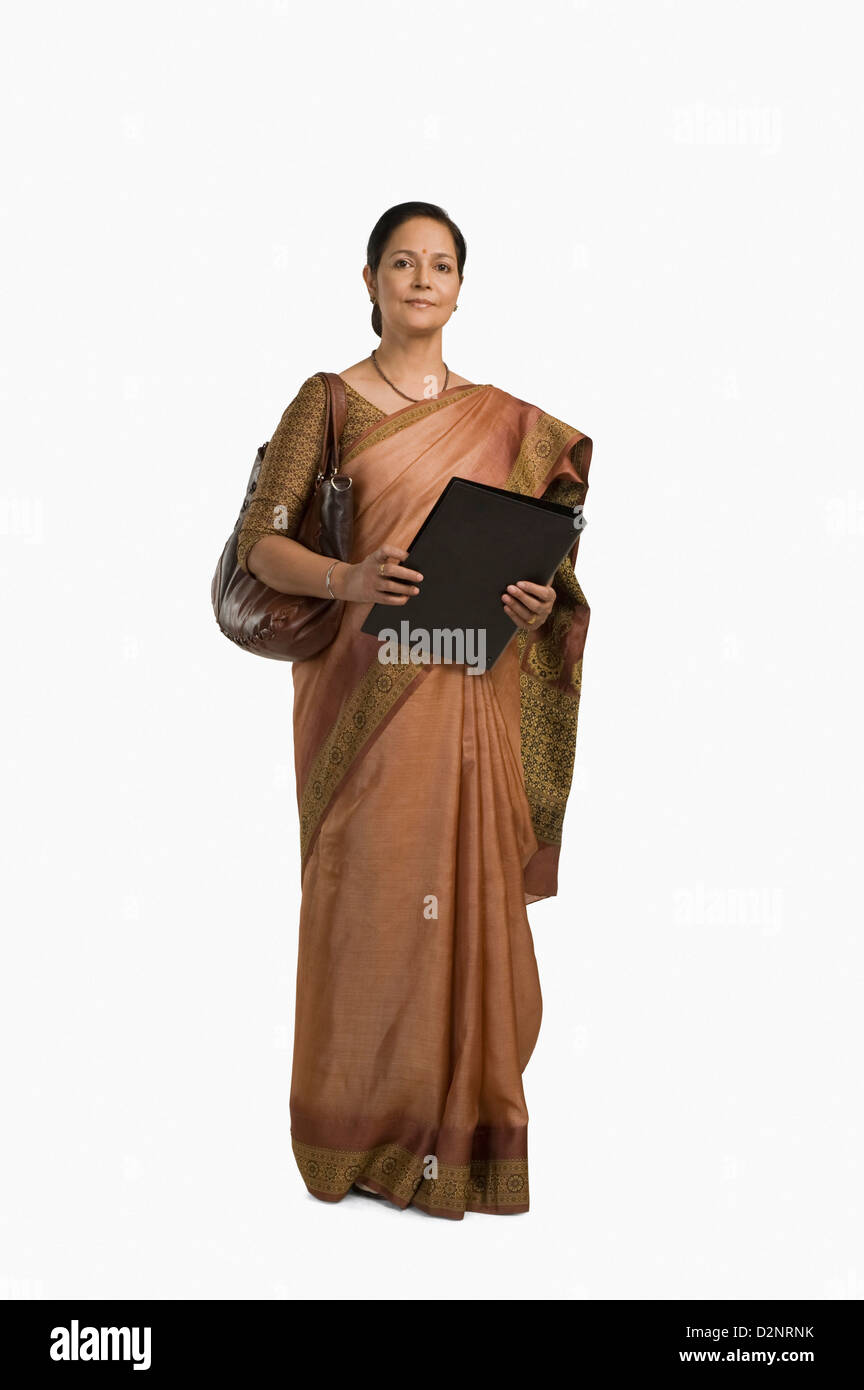 Businesswoman holding a file Stock Photo